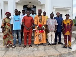 Igwe Asadu in a group photo with some members of the market building committee.