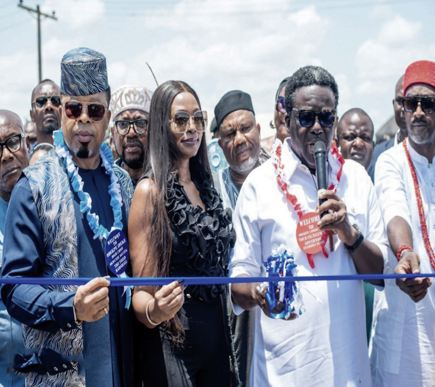 L-R- Chief Obele, his wife, Udeze and Igwe Okasili during the commissioning of the project