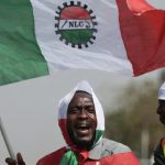 Man waving NLC flag