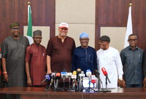 FCT Minister Nyesom Wike (3rd right) the Chief of Staff to the FCT Minister, Chidi Amadi (right) Chairman, Board of DAAR Communication Chief Raymond Dokpesi Jr (4th right) and some management staff of DAAR Communication during a courtesy visit by the organization to the FCTA on Tuesday, April 7, 2026