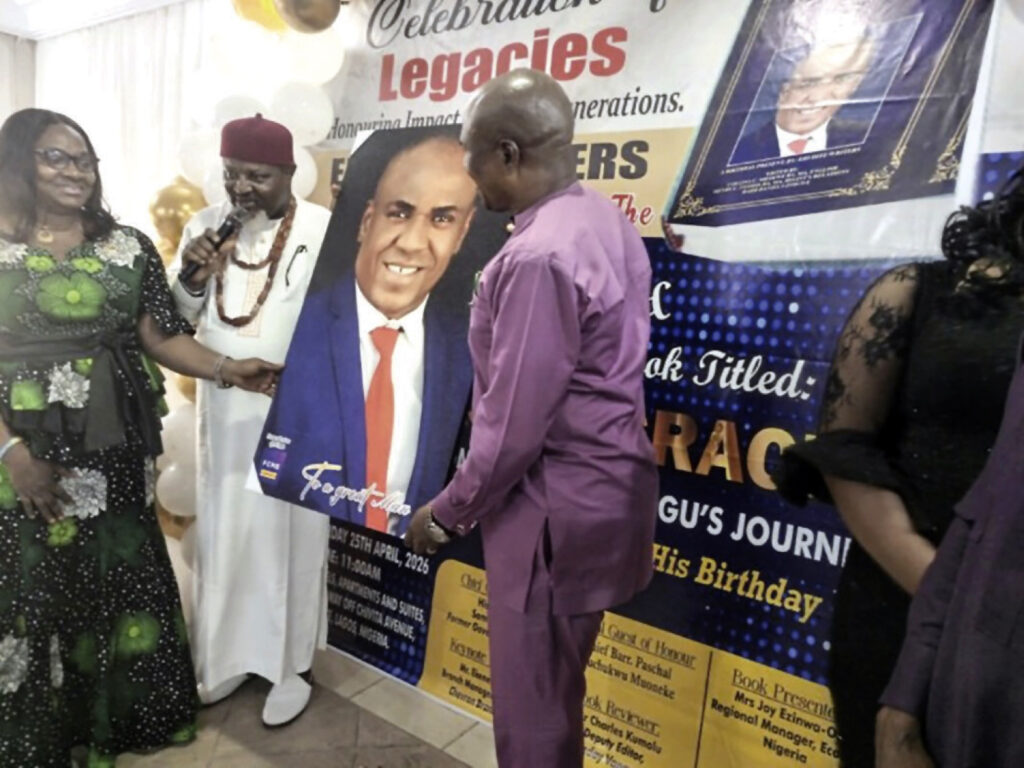 Presentation of a portrait to Mbisiogu and wife