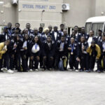 Prof. Lafiaji-Okuneye (middle) with coaches and athletes