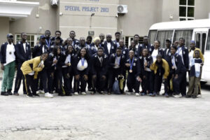 Prof. Lafiaji-Okuneye (middle) with coaches and athletes