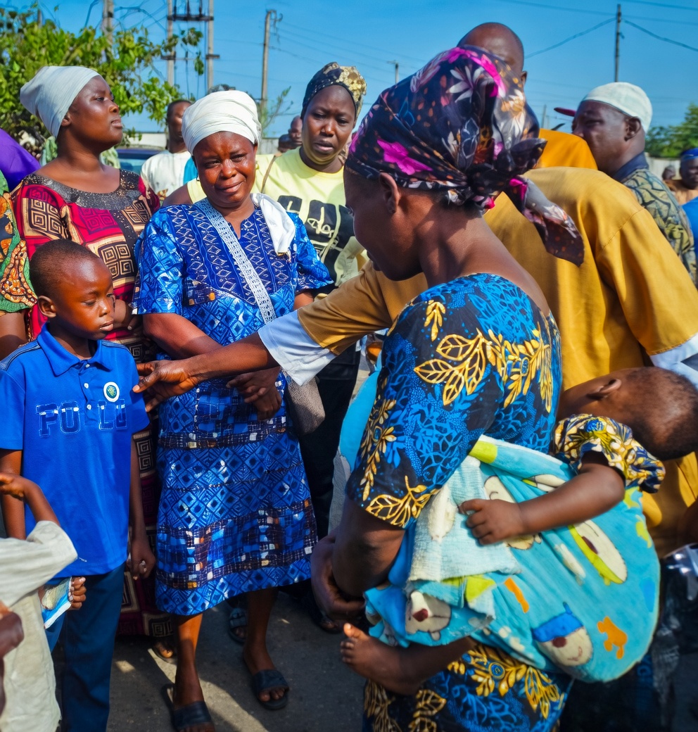 Wives and children of some of the deceased traders