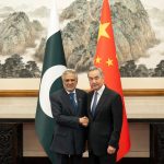 Chinese Foreign Minister Wang Yi (right) with Pakistani Deputy Prime Minister and Foreign Minister Mohammad Ishaq Dar in Beijing (Photo credit: Xinhua News Agency)