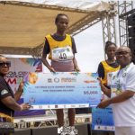 • Deputy Governor of Bayelsa State, Dr. Peter Akpe (right) presenting the cheque to winners.