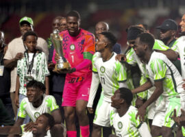 Super Eagles Captain Francis Ozoho receives the Unity Cup