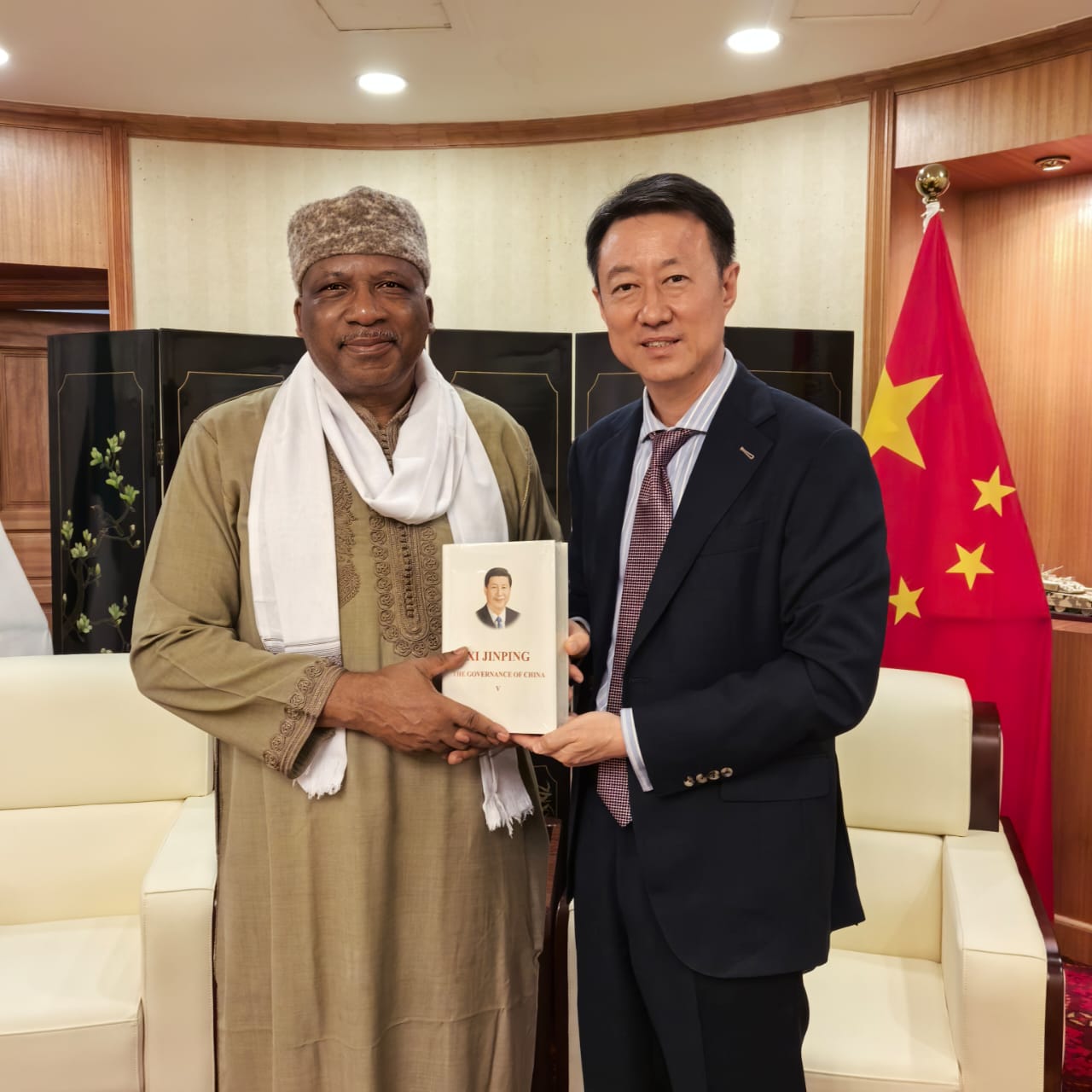 The Chinese Ambassador to Nigeria, Yu Dunhai (r), with the Nigerian Ambassador-Designate to the People’s Republic of China, Abdurahman Bello Dambazau in Abuja.