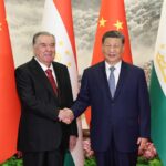 Chinese President Xi Jinpin (r), with Tajik President Emomali Rahmon, at the Great Hall of the People in Beijing, China