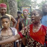 •One of the women at the protest, Ifesinachi Ogbodo, expressing anger.