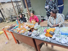 Suspects and items recovered during the parade of the suspects on Monday, May 11, 2026