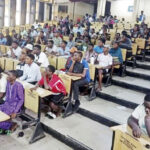 •Students in a lecture hall.