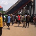 Miracle in Onitsha as 40-foot trailer falls from flyover, no casualties