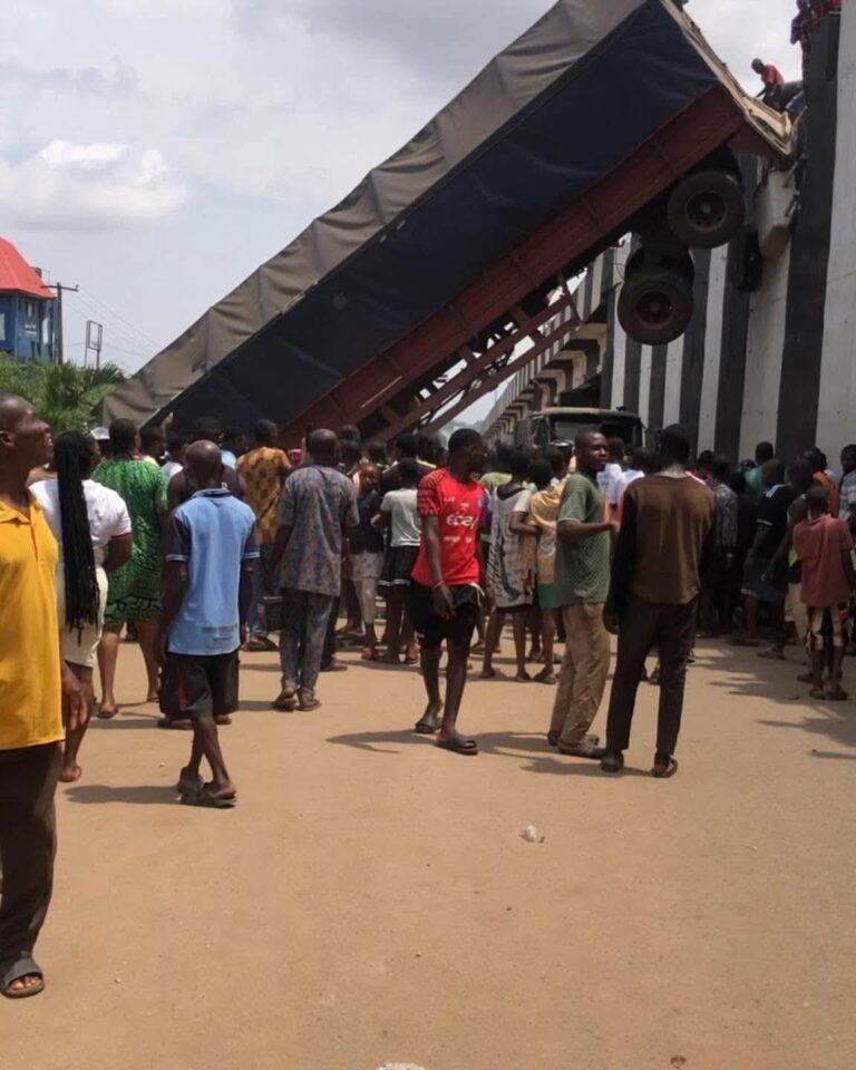 Miracle in Onitsha as 40-foot trailer falls from flyover, no casualties