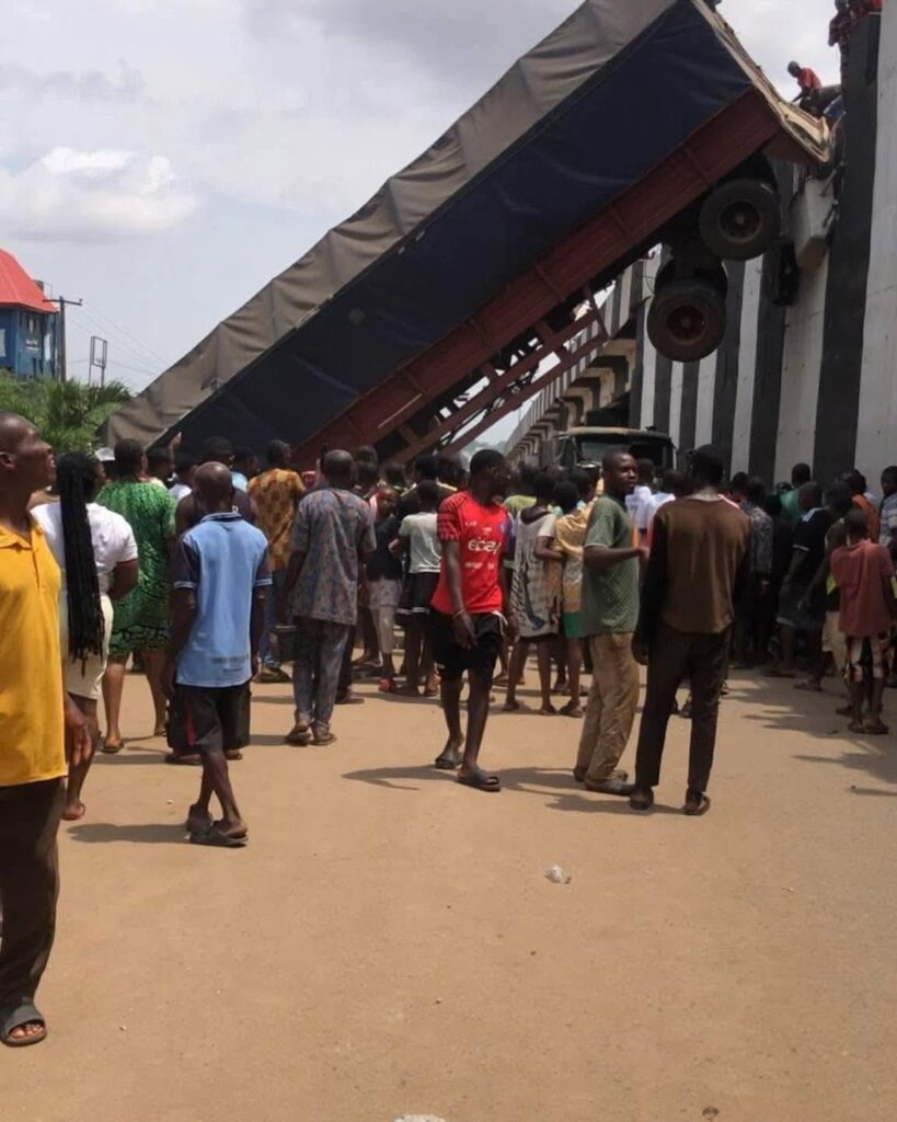 Miracle in Onitsha as 40-foot trailer falls from flyover, no casualties