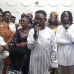 Celebrant and family members during the service