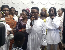 Celebrant and family members during the service