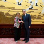 Chinese Foreign Minister, Wang Yi (r), with Candidate for the position of United Nations Secretary-General, Michelle Bachelet in Beijing, China