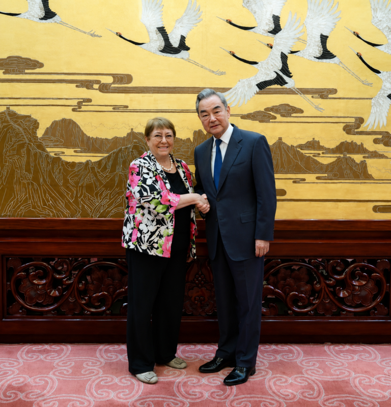 Chinese Foreign Minister, Wang Yi (r), with Candidate for the position of United Nations Secretary-General, Michelle Bachelet in Beijing, China