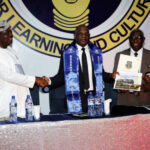 Echono in a handshake with officials of OAU after he delivered at the 65th anniversary celebration of Obafemi Awolowo University (OAU), Ile-Ife.
