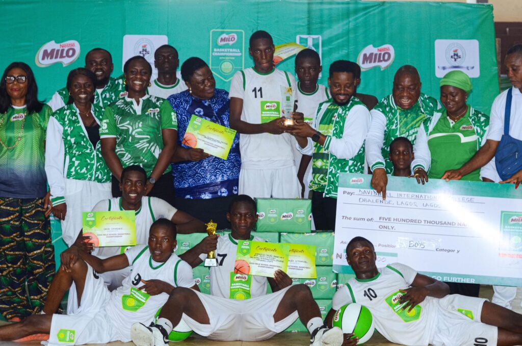 Players-and-officials-of-Davidhall-International-School-Ikoyi-Lagos-after-the-presentation-of-their-trophy-scaled