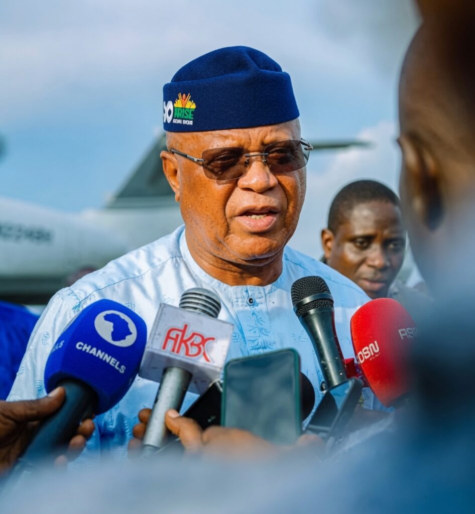 Governor Umo Eno addressing reporters at Victor Attah’s International Airport on integrating village youth leaders into stare security architecture