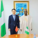 The Chinese Ambassador to Nigeria, Yu Dunhai (l), with the Permanent Secretary, Ministry of Foreign Affairs, Dunoma Umar Ahmed during a meeting in Abuja.