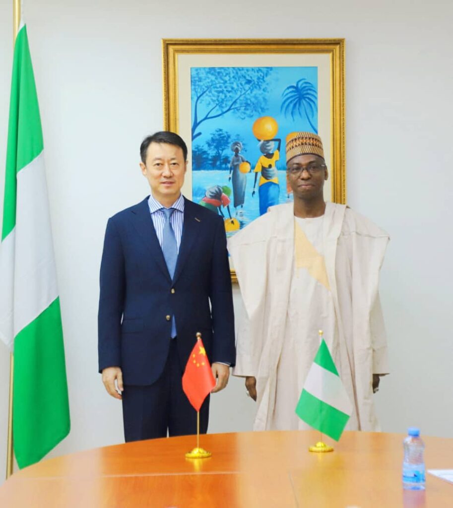 The Chinese Ambassador to Nigeria, Yu Dunhai (l), with the Permanent Secretary, Ministry of Foreign Affairs, Dunoma Umar Ahmed during a meeting in Abuja.