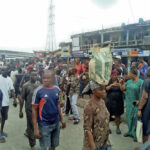 A crowd at the scene