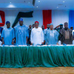 Renewed Hope Ambassadors leadership led by its Director General and Governor of Imo State, Hope Uzodimma (middle) with National Chairman of the All Progressives Congress (APC), Nentawe Yilwatda, at the opening of a two‑day National Mobilisation Retreat in Abuja