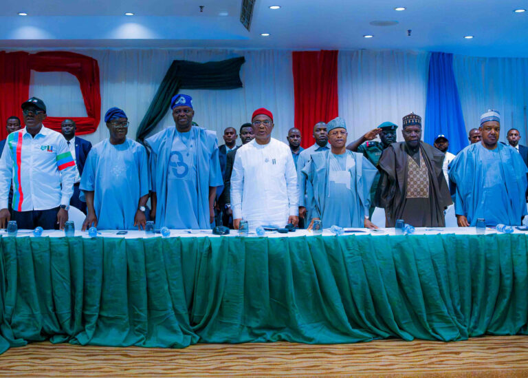 Renewed Hope Ambassadors leadership led by its Director General and Governor of Imo State, Hope Uzodimma (middle) with National Chairman of the All Progressives Congress (APC), Nentawe Yilwatda, at the opening of a two‑day National Mobilisation Retreat in Abuja