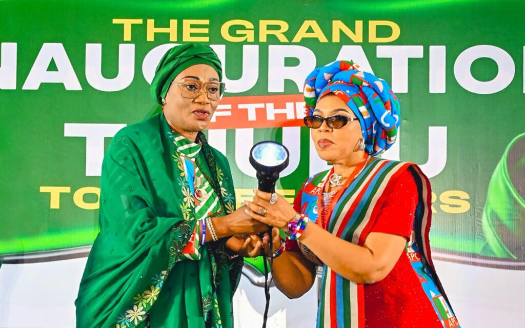 First Lady of Nigeria Senator Oluremi Tinubu handing over the Torch in a symbolic presentation to the National Women Leader of the APC Mary Idele when the First Lady inaugurated the Tinubu Torch Bearers in Abuja on Wednesday 3rd June 2026