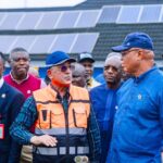 Eno during inspection of flooding areas in Uyo