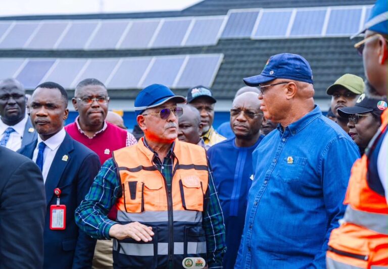 Eno during inspection of flooding areas in Uyo