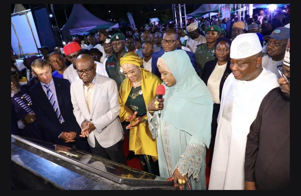 L-R: MD, Julius Berger PLC, Dr Peer Lubasch; FCT Minister, Nyesom Wike; First Lady of the Federal Republic of Nigeria, Oluremi Tinubu; FCT Minister of State, Mariya Mahmoud; Osita Izunaso during the cutting of the tape for the commissioning of the Remodelled Abuja City Gate on Thursday, July 9, 2026