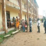 Voters queuing up to cast their votes during the LG poll At Agbado Primary School, Oredo Ward 4