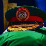 President Muhamnadu Buhari military cap