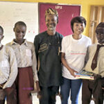 Keye with some students and am official at the career guidance session