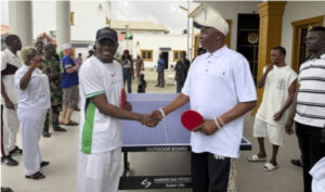 L-R- Lagos monarchs, Oba Ibrahim Olasunkanmi Olanwa and Oba Sulaimon Adeshina Raji (Jafo) in a table tennis clash