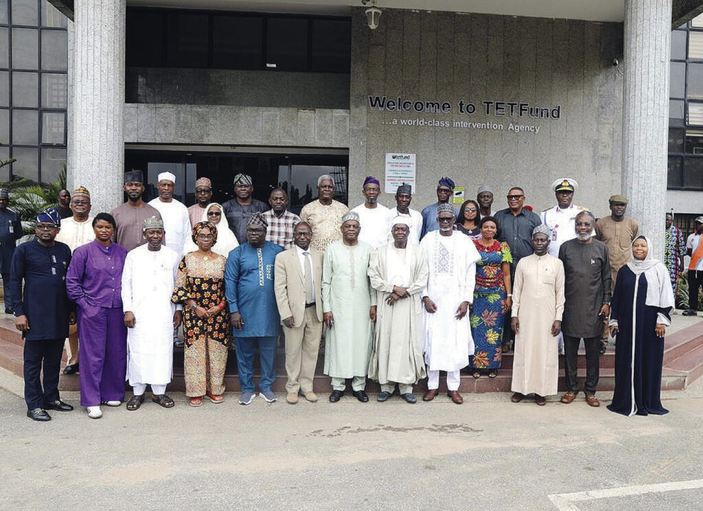 Members of the committee in a group photograph with TETFund management