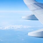 TAL-plane-over-clouds-FLY35KFT-862a180619f046aea1275ca294fa9116