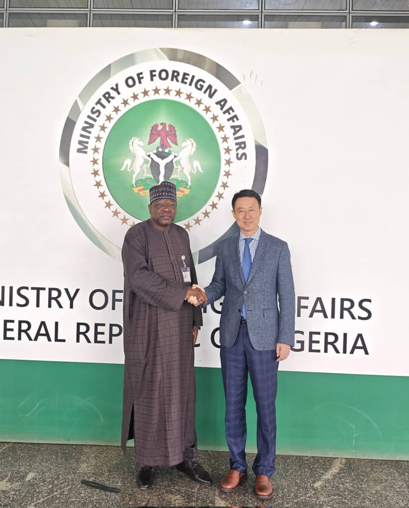 The Chinese Ambassador to Nigeria, Yu Dunhai (r), with the Director of Regions, Ministry of Foreign Affairs, Ambassador Grema Garba Satom, during a meeting in Abuja.