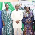 UniAbuja VC in a group photograph with the research team