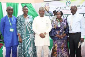 UniAbuja VC in a group photograph with the research team