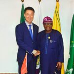 The Chinese Ambassador to Nigeria, Yu Dunhai (l), with the Minister of State, Foreign Affairs, Ambassador Sola Enikanolaiye, when the minister received the Chinese envoy in audience at the Tafawa Balewa House, Abuja