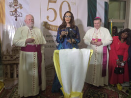 The Minister of Foreign Affairs, Ambassador Bianca Odumegwu-Ojukwu (m); the Holy See’s Secretary for Relations with States and International Organizations, Archbishop Paul Richard Gallagher (l) and the Apostolic Nuncio to Nigeria, Archbishop Michael  Crotty (r), at a reception in Abuja to commemorate the first anniversary of the election of Pope Leo XIV and the 50th anniversary of the establishment of diplomatic relations between the Holy See and Nigeria and the Visit of Gallagher to Nigeria
