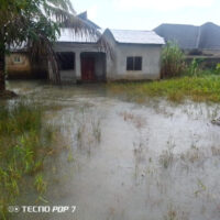 Receding flood water from one of the affected houses in Arab Community