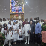 Front Roll: The Immediate Past Minister of Women Affairs, Dame Pauline Tallen (r), the Deputy Governor of Nasarawa State, Dr Emmanuel Akabe (2nd r); the Israeli Ambassador to Nigeria, Michael Freeman (3rd r).  Back Roll: The Catholic Archbishop of Abuja, Most Revd (Dr) Ignatius Kaigama (m), the Auxiliary Bishop of Abuja, Most Revd Anselm Umoren (5th l), son of the deceased, Professor John Kennedy Opara (4th l), the members of the Opara family and other dignitaries who attended the Requiem Mass in honour of Mama Ezinne Christiana Opara, mother of the Chairman, CSS Group of Companies, Professor John Kennedy Opara held at the Holy Trinity Catholic Church, Maitama, Abuja
