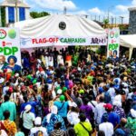 Cross section of party faithful and supporters at the campaign flag off