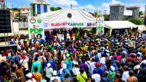 Cross section of party faithful and supporters at the campaign flag off